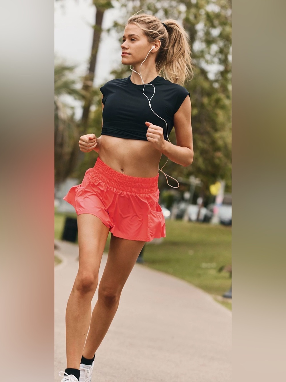 Free People Movement get you flirt on shorts in neon coral